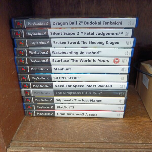 PlayStation 2 games lot featuring Dragon Ball Z cases.