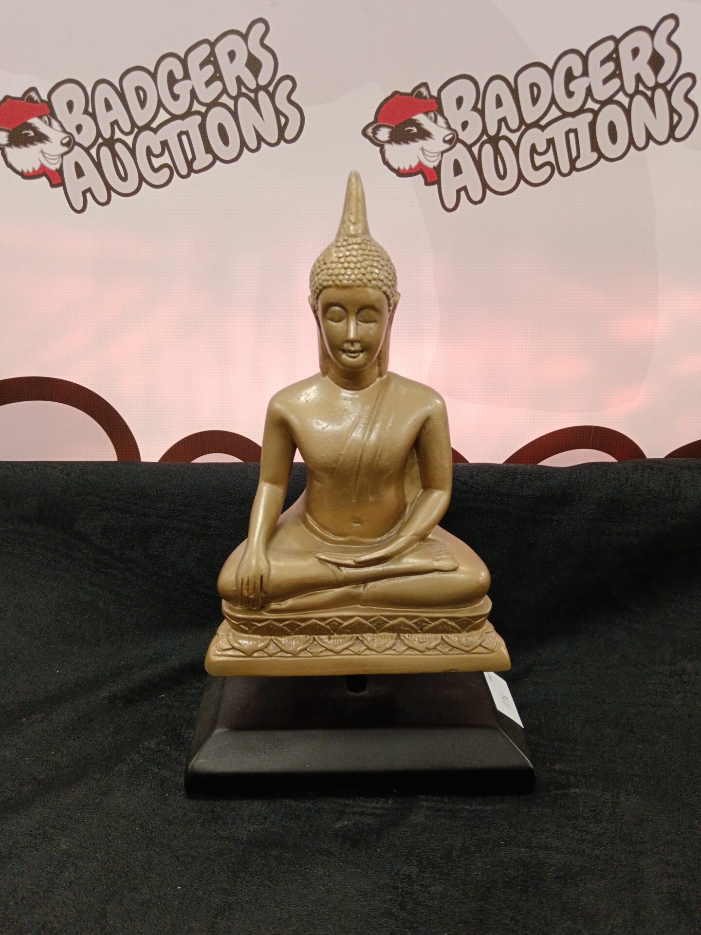 035 Gold tone Buddha on plinth
