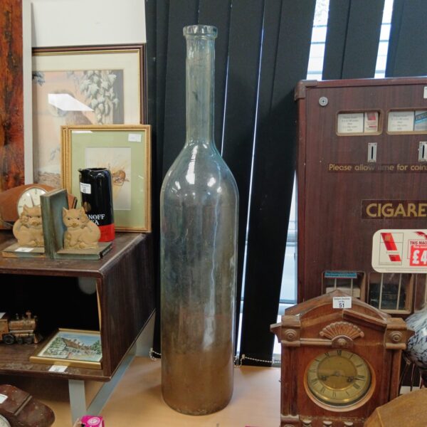 Large hand blown glass bottle, antique decorative glassware.