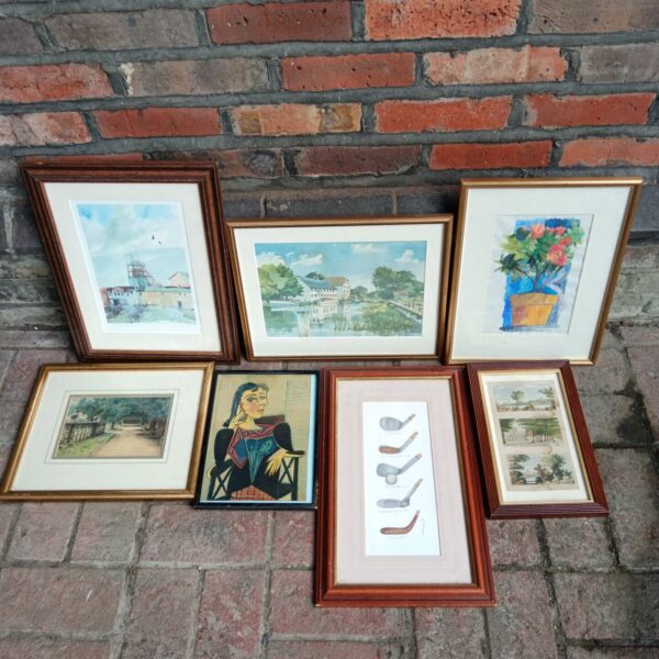 Vintage landscape watercolour print in a gold frame.