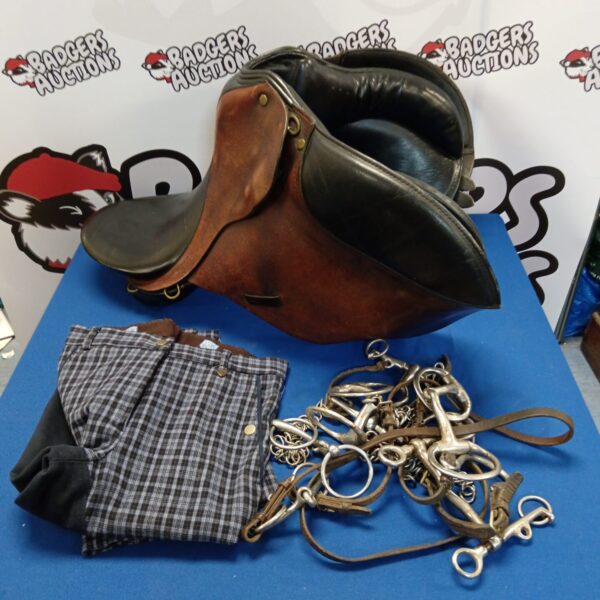Vintage John Goodwin 17 inch pony saddle with accessories.