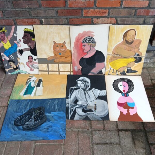 Lot of modern street art watercolour paintings with diverse portraits.