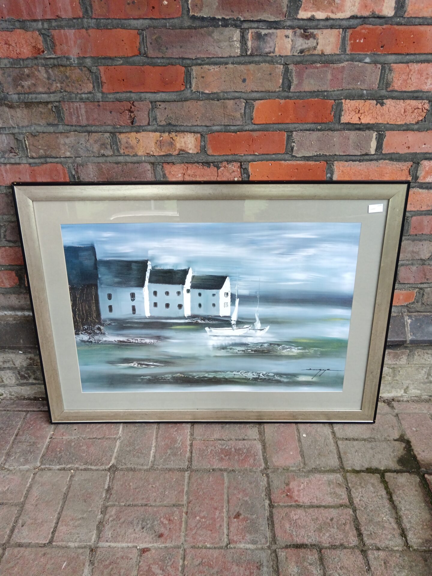 643 Large framed print of coastal cottages & boats