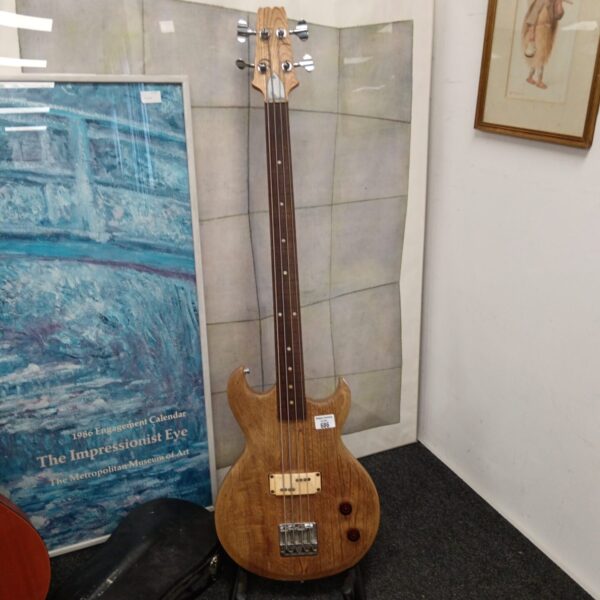 Natural finish Matsumoko bass guitar from the 1980s.