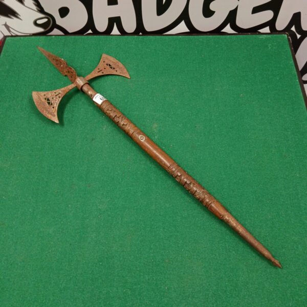 Vintage Indian ceremonial axe with decorative blade.