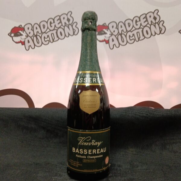 Sealed bottle of Vouvray Bassereau Champagne, a French sparkling wine.