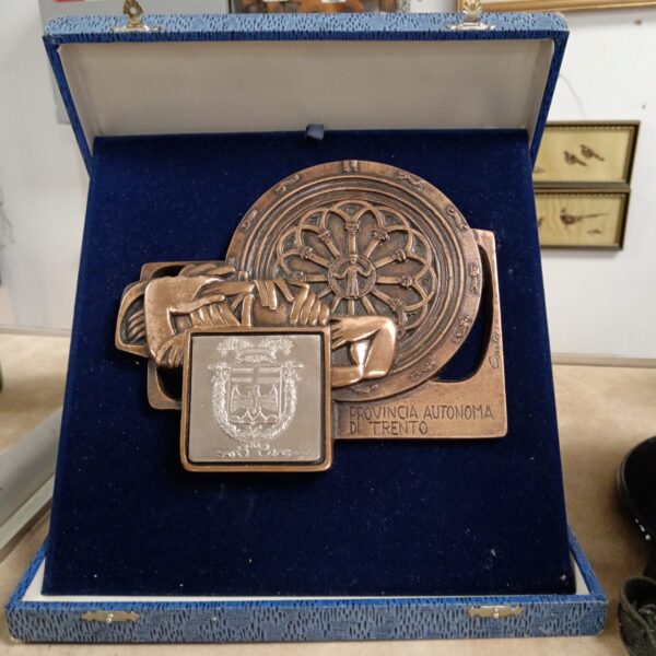 Vintage Italian bronze wall plaque by Livio Conta, detailed relief.