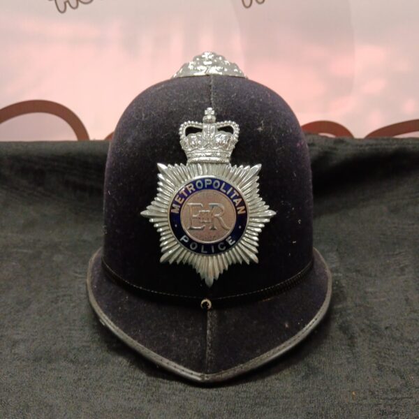 Vintage 1980s Metropolitan Police helmet with crest.