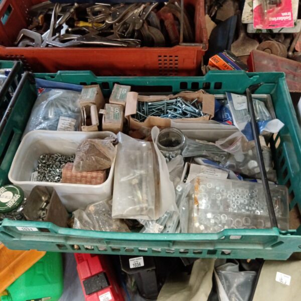 Mixed hardware lot with nails and screws for DIY projects.
