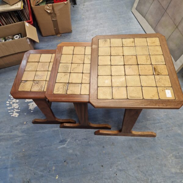 Vintage Gplan nest of tables with tile tops in good condition.