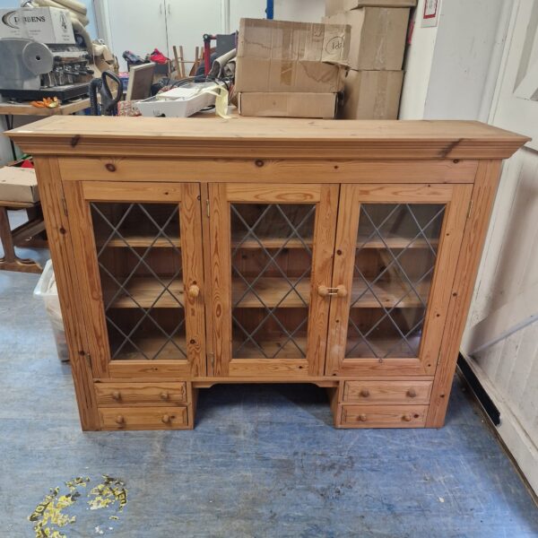Vintage pine Welsh dresser top with leaded glass panels.