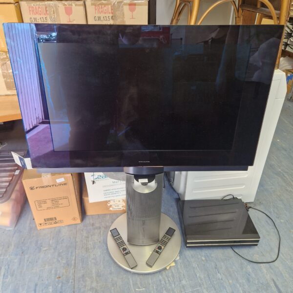 Vintage Bang & Olufsen widescreen television on rotating stand.