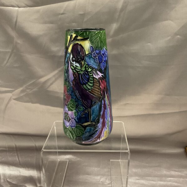 Front view of a vibrant Trogonware vase with bird design.
