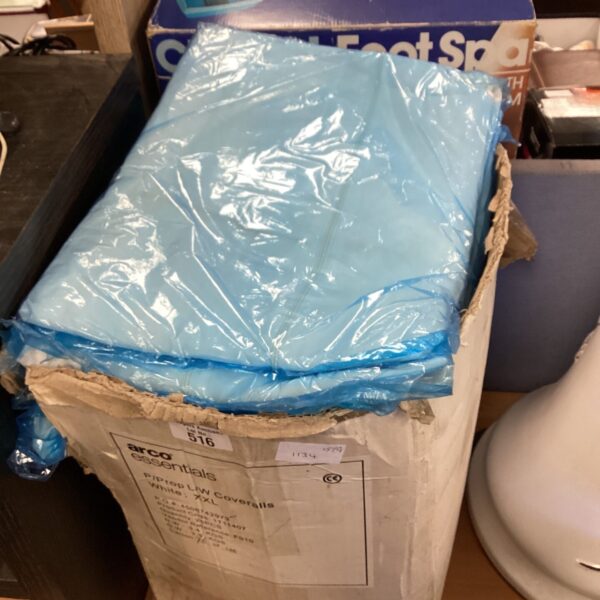 Sealed package of Arco Disposable Coveralls in size XXL.