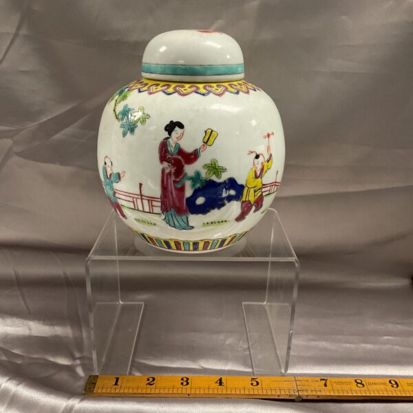 Vintage Chinese ginger jar with hand-painted figures and lid.