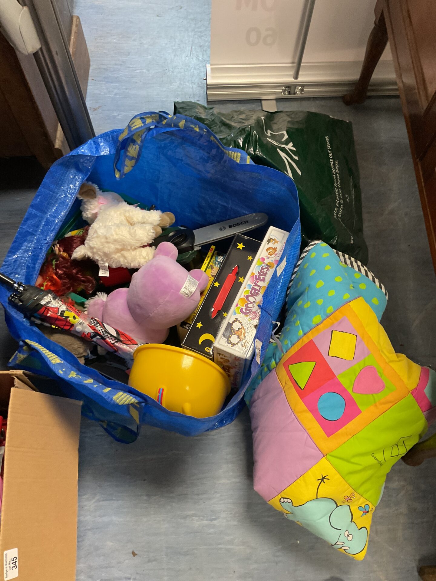 386 Bag of mixed toys and kids costumes with blanket
