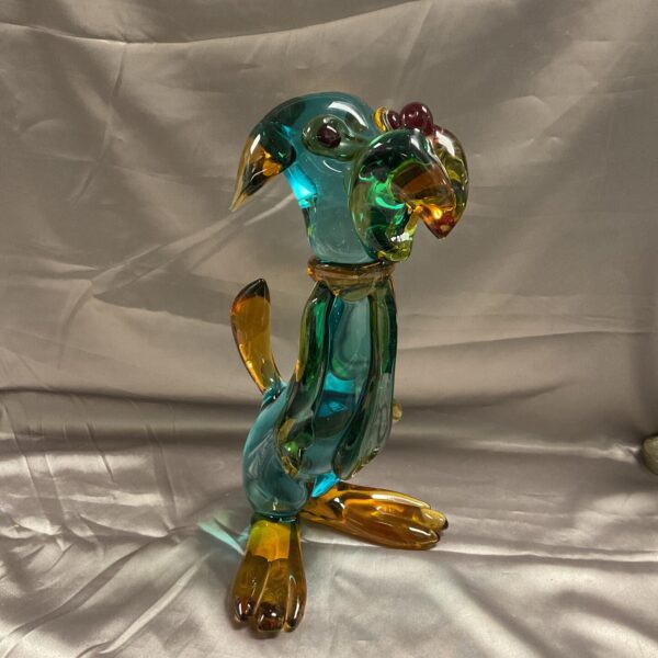 Vibrant Murano glass dog sculpture with teal and amber colours.