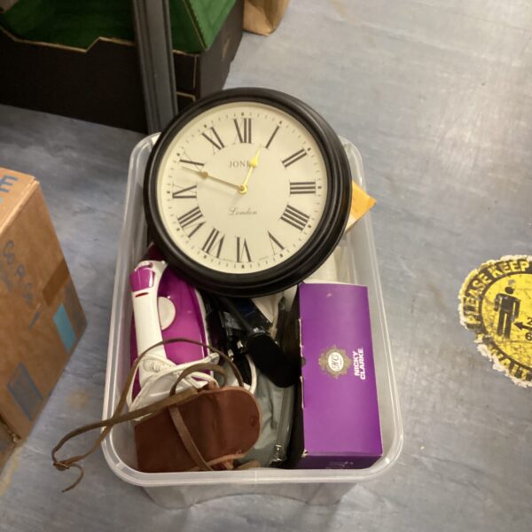 Vintage Jones wall clock with Roman numerals on a cream face.