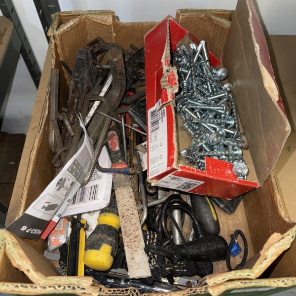 Assorted garden tools and hardware in a shed clearance lot.