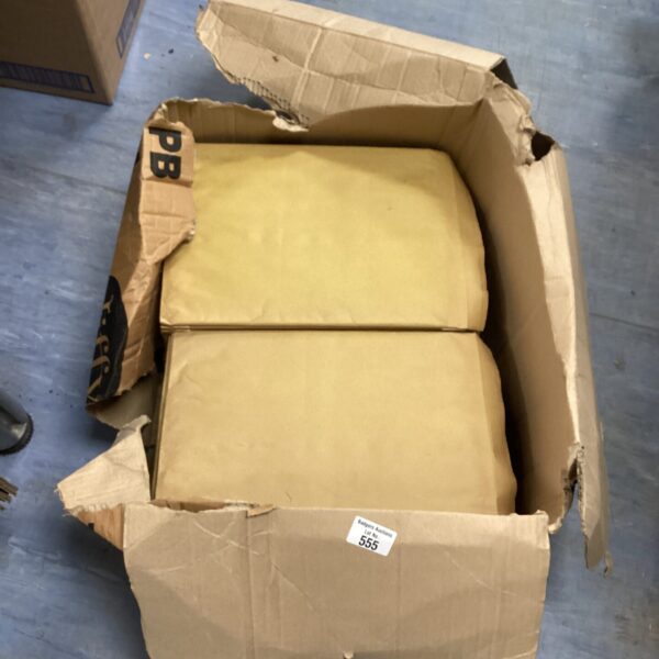 Stack of used padded envelopes for mailing and shipping.