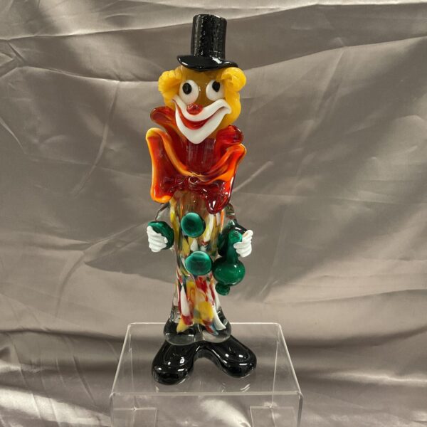 Colourful Murano glass clown musician figurine with instruments.