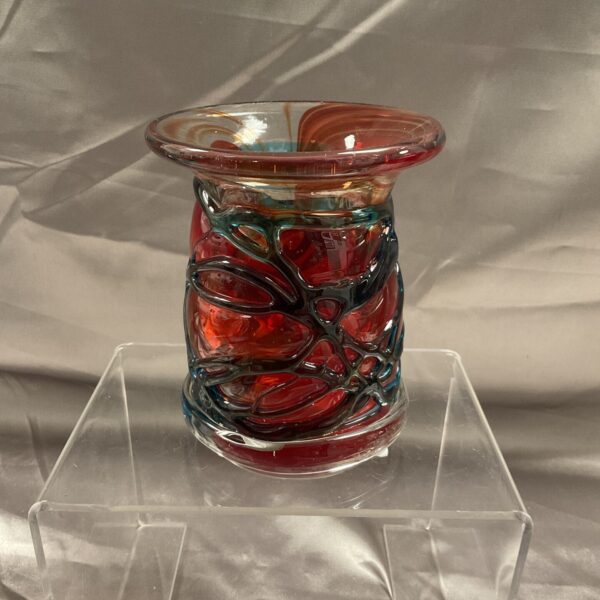 Vintage Mdina glass vase with red, blue, and white trailing.