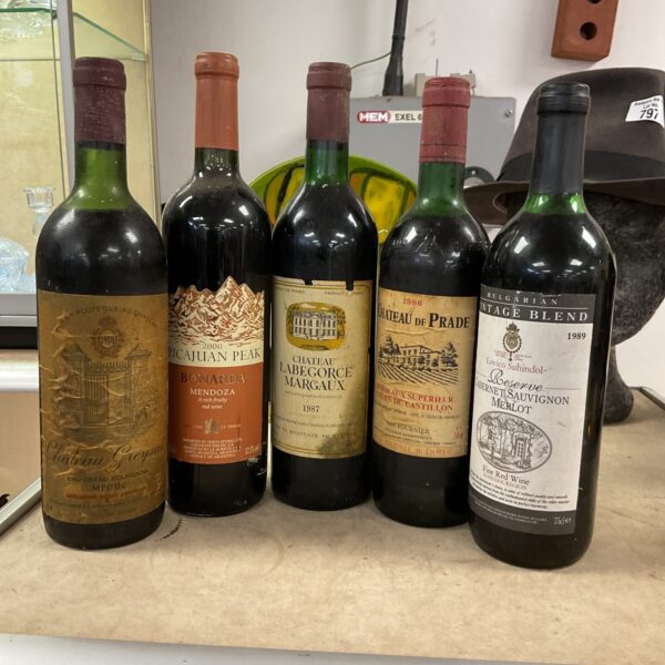 Vintage wine collection featuring French and Bulgarian bottles.