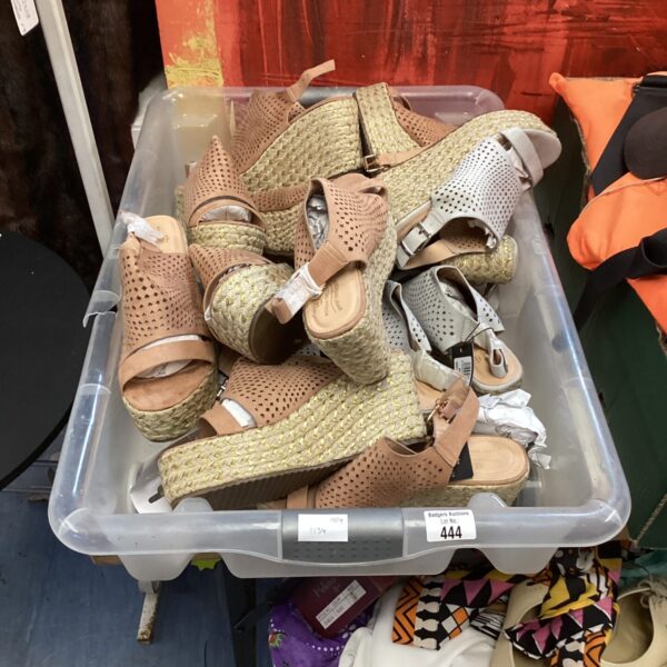 Tray of new ladies’ platform wedge shoes in assorted sizes.