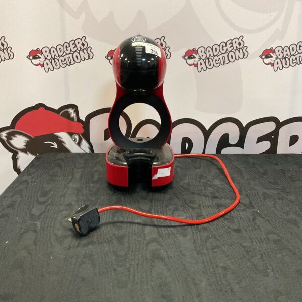 Black Dolce Gusto coffee machine for home brewing.