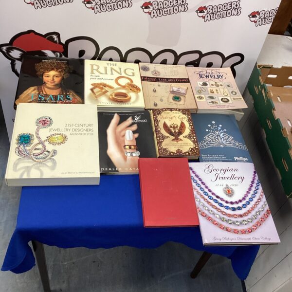 Collection of vintage jewellery books and dealer catalogs.