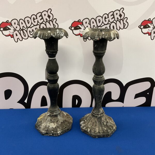 Antique cast iron candlesticks, a pair of vintage candle holders.
