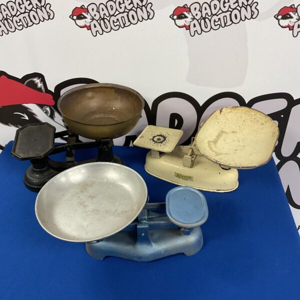 Vintage Harper cast iron scales with pans, a collectible kitchen item.