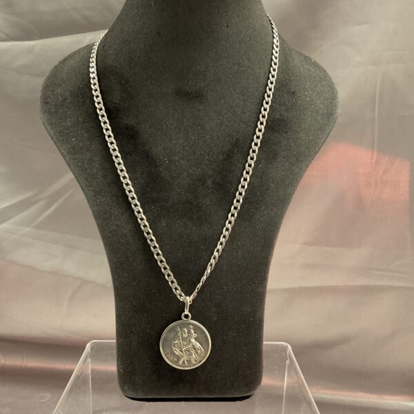 Vintage silver St Christopher pendant on a heavy silver chain.