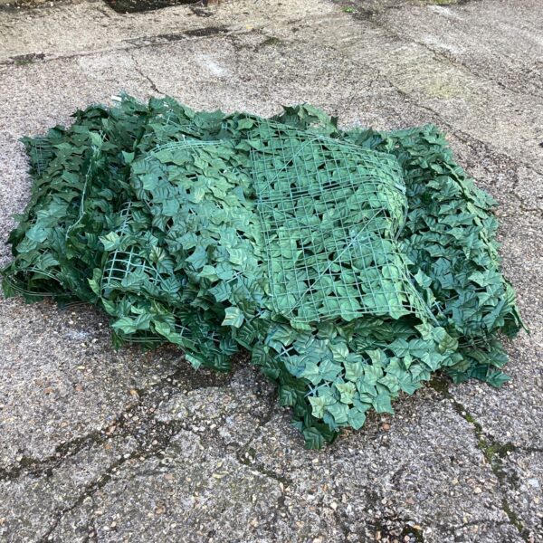 Artificial ivy garden fence screen for outdoor privacy.