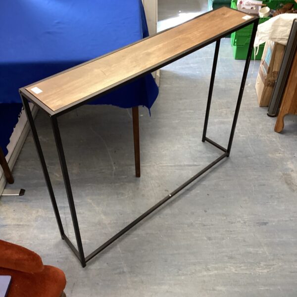 Modern hall table with metal frame for entryway or hallway.