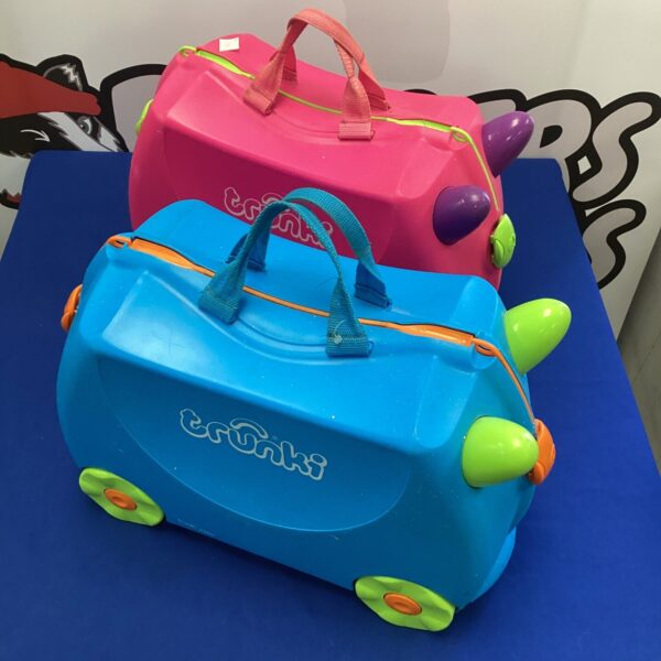 Brightly coloured kids ride on suitcases, perfect for travel.