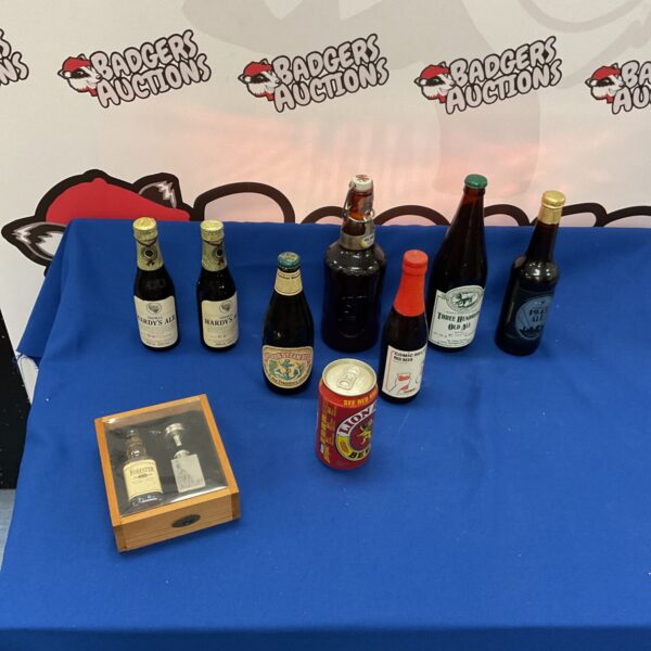 Vintage lot of ales, beers, and Forester whiskey for collectors.