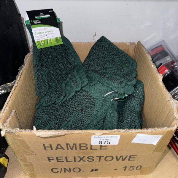 Box of new Green Blade gardening gloves for garden work.
