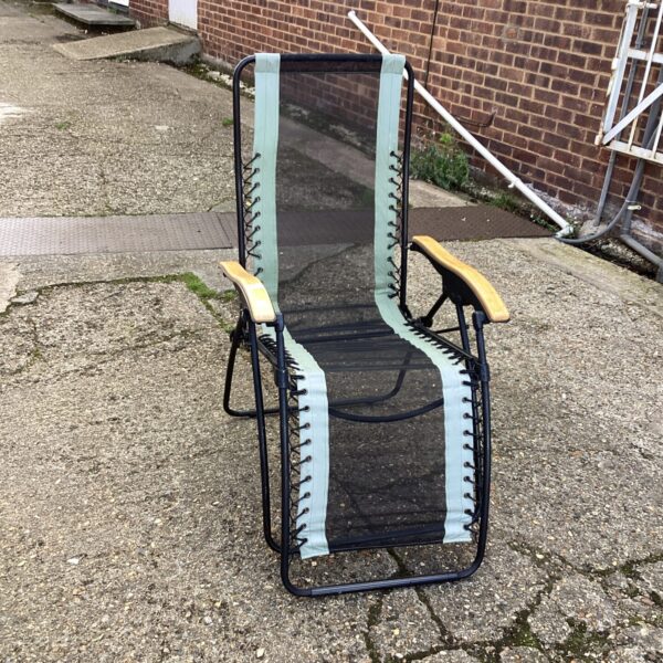 Woven reclining garden chair with metal frame.