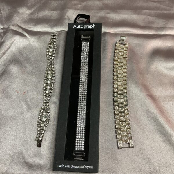 Sparkling Swarovski crystal Autograph bracelet in silver tone.