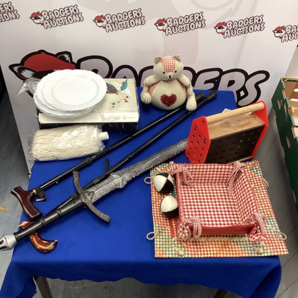 Mixed lot of vintage walking sticks, toy swords, and building blocks.