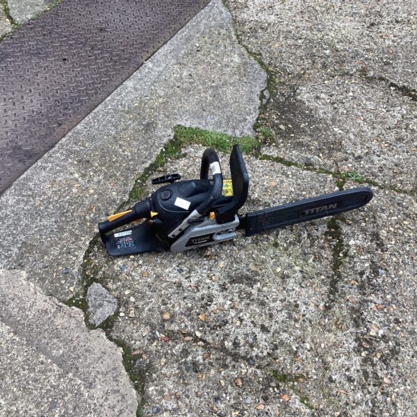 Used Titan petrol chainsaw for garden and DIY tasks.