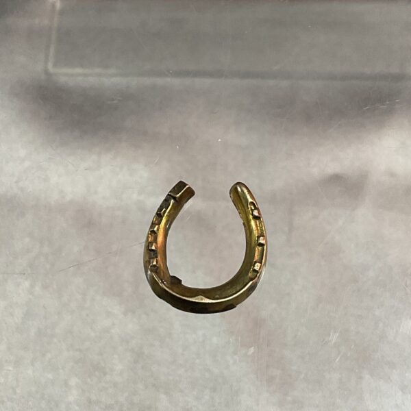Delicate 9ct gold horseshoe charm for jewellery making.