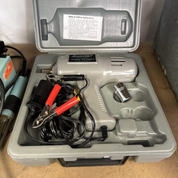 Vintage Lustrex 12v DC impact gun in a plastic case.
