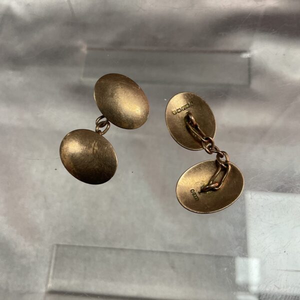 Pair of classic 9ct gold cufflinks for formal wear.