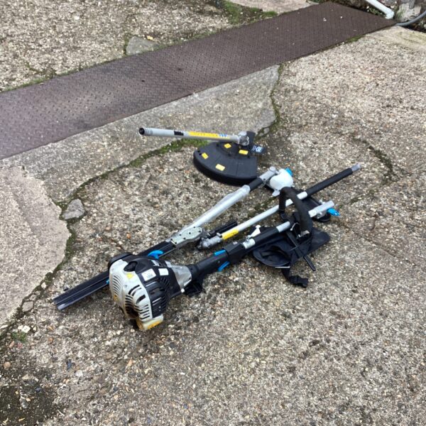 Mac Allister petrol garden multi tool with attachments for versatile gardening.