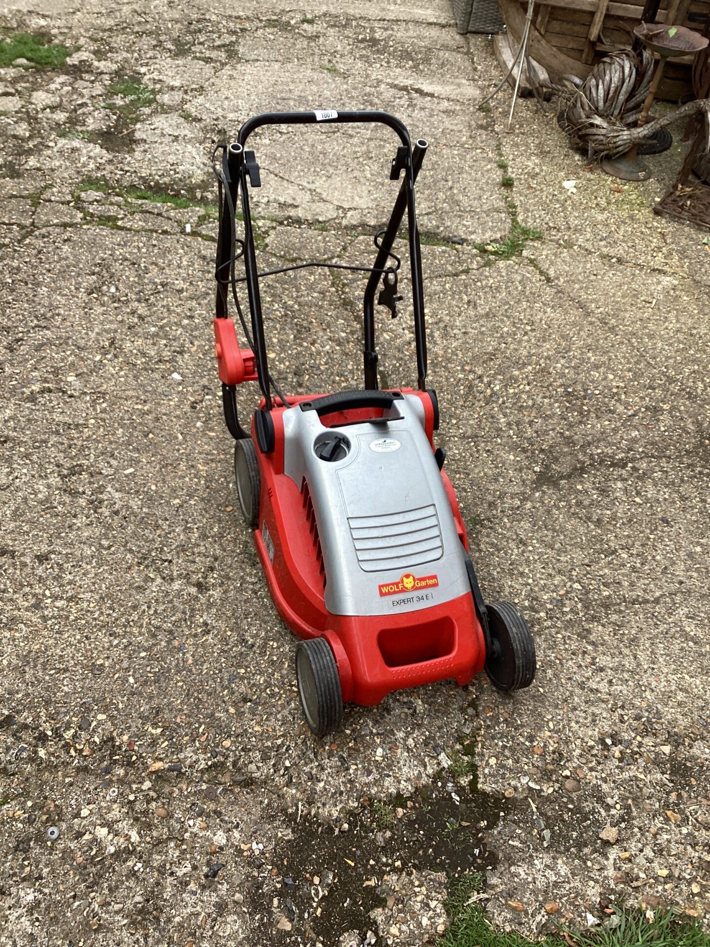 1068 Wolf Battery Lawn mower sold as seen
