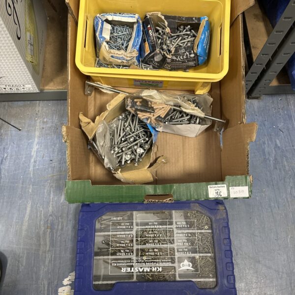 Mixed lot of assorted metal screws for DIY projects.