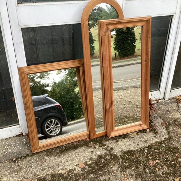Lot of three vintage wooden framed mirrors for home decor.