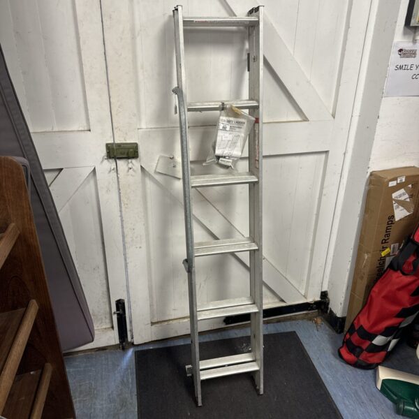 Metal folding loft ladder for attic access.